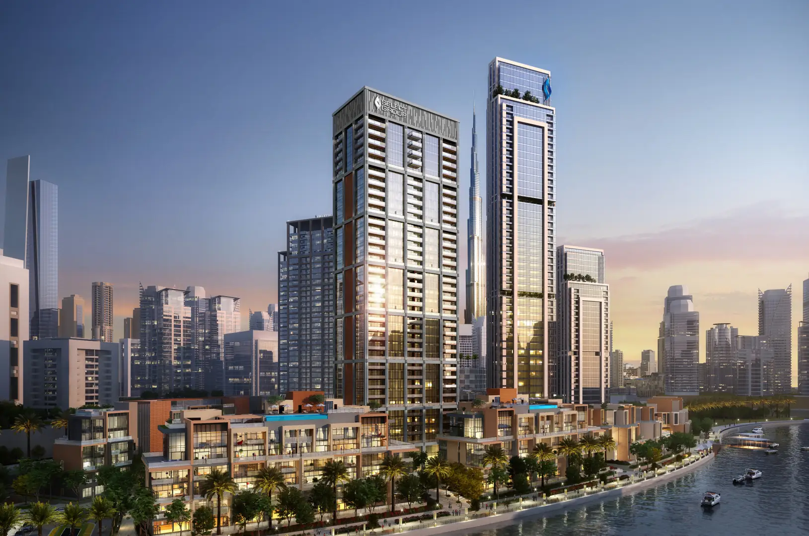 The Peninsula towers and townhouse podium on the Dubai Water Canal at dusk